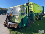 2010 CCC packer truck, Expert 2000 packer body, dual operator seats, 31 yd, automatic transmission,