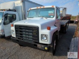1982 International S1754 single axle flat bed truck, 12ft body, 5 speed transmission, 21,000lb GVW,