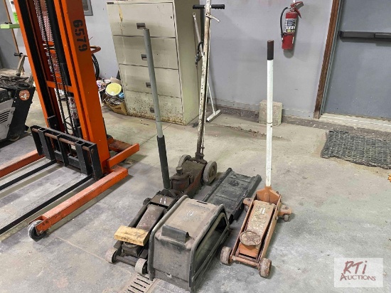 (3) Floor jacks. Wheel chocks.
