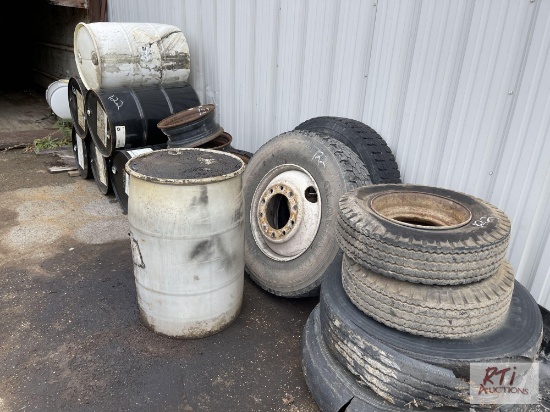 Contents of 2 trailers, 7 55 gallon drums and tires