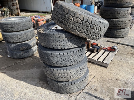 (4) BF Goodrich LT265/75R16 tires with rims. Cooper Discoverer LT275/70R18