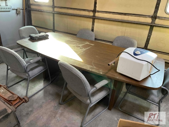 Conference table. (6) Chairs