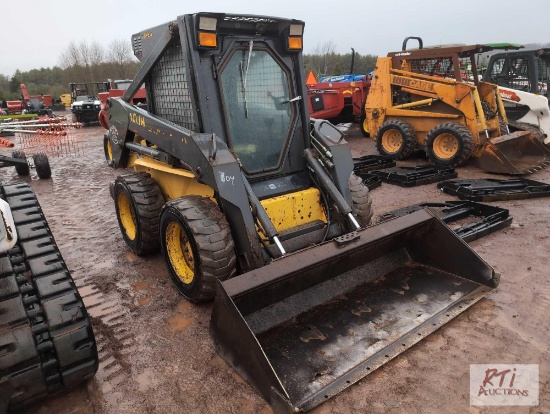 New Holland LS170 skid loader, cab, heat, hand and foot controls, 2830 hrs