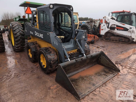 John Deere 320E skid loader, power wedges, GP bucket, cab, missing door, heat, A/C, 9704 hrs