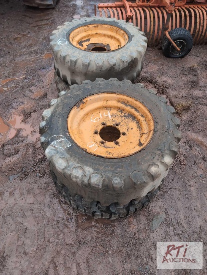 (4) Case skid loader tires and wheels