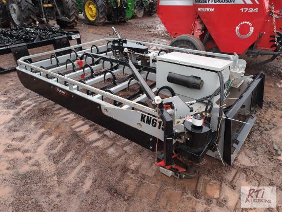 Kuhns skid loader mount hydraulic bale grabber with twin wrapper