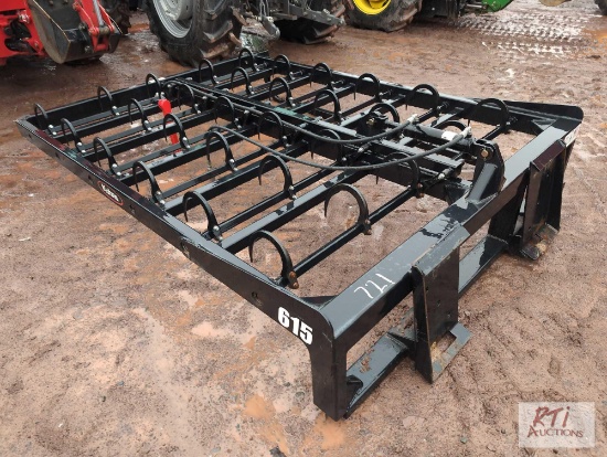Kuhns 615 skid loader mount bale grabber