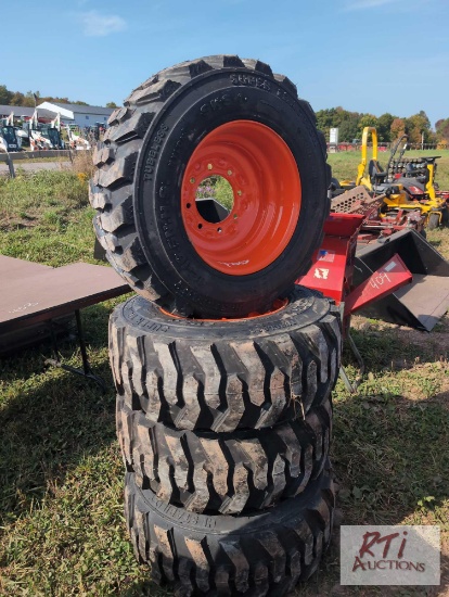 4X 12-16.5 skid loader tires on Bobcat rims...