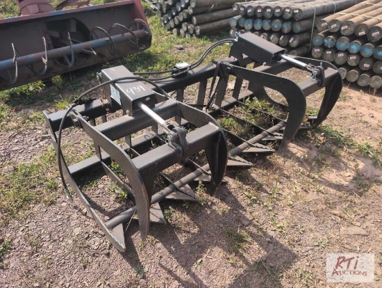 New skid steer rock grapple bucket
