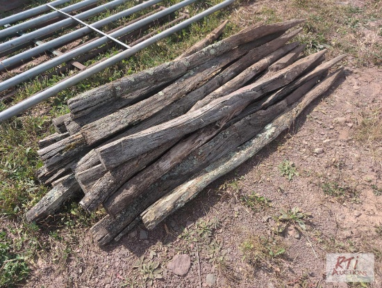 Pile of used fence posts