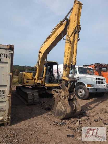 Komatsu PC120 excavator with hydraulic coupler, looks rough but runs and works as it should
