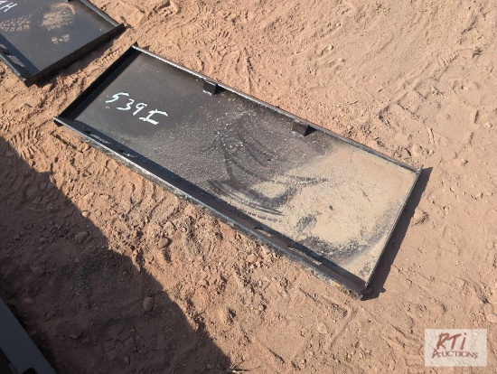 Skid loader backer plate