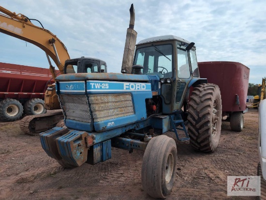 Ford TW25 tractor with cab, front weights, 38in rear tires, 2 remotes, 3pt PTO