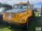2002 International 4700 T44E, crew cab, dually, 12ft stake body, 5 speed Spicer manual transmission,