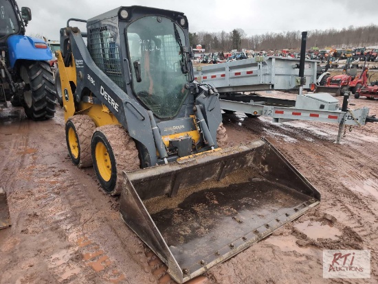John Deere 318G skid steer loader with cab, hydraulic coupler, bucket, 1662 hrs