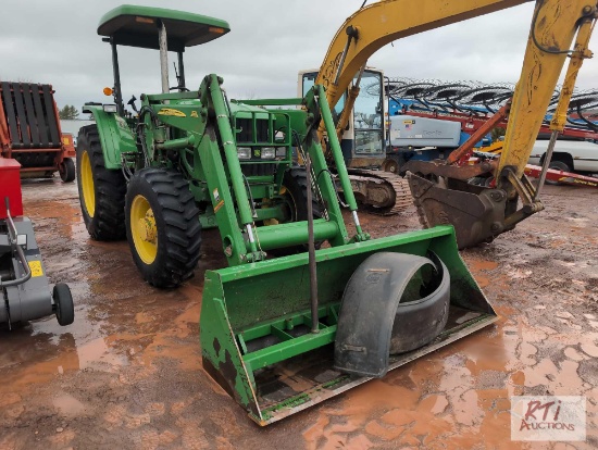 John Deere 6115D MFWD tractor with canopy, 18x34 tires, 3 remotes, front end loader, bale spear and