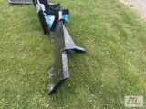 Hitch receiver for skid loader