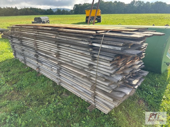 Approximately (125) pieces of 8in x 12ft rough cut lumber. Quantity and measurements are estimates.