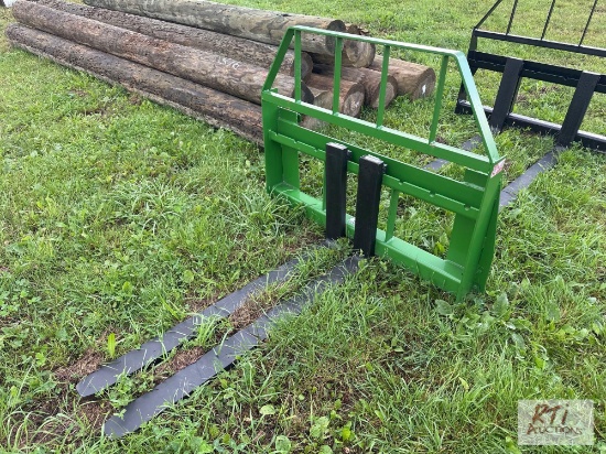 Pallet forks with John Deere coupler with 48in tines.