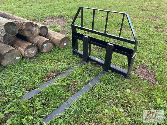 Pallet forks for skid loader with 48in tines.