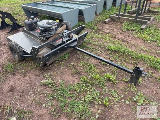 Swisher tow behind 44in finish mower with 14hp gas engine.