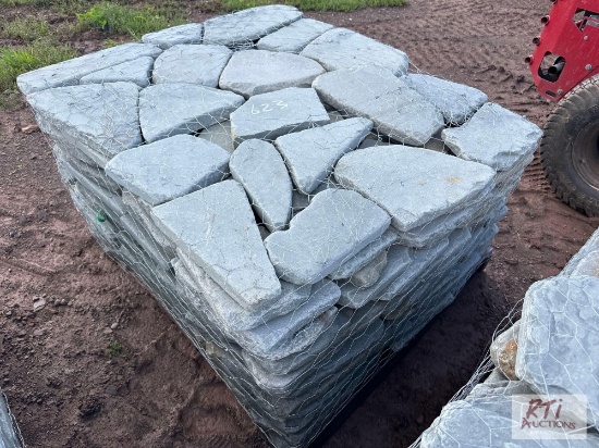 Pallet of tumbled bluestone pavers.