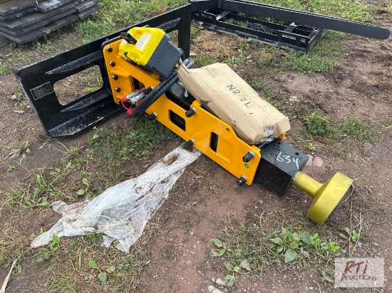 Future D680 hydraulic post pounder for skid loader.
