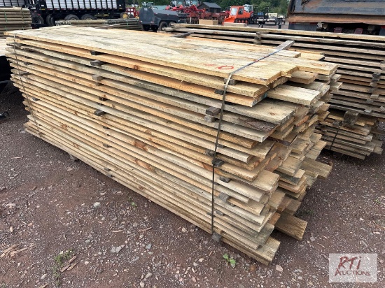 Pile of 6in x 8.5ft rough cut lumber. Quantity and measurements are estimates.