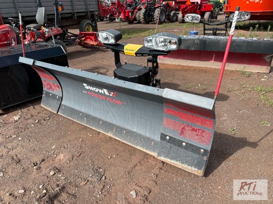 Snow-Ex power plow with extendable wings.