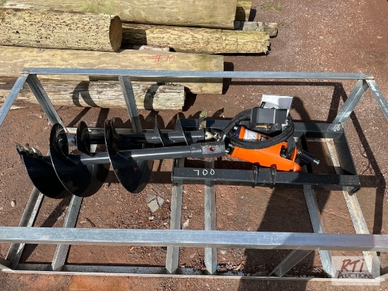 Wolverine hydraulic post hole digger with 18in and 12in augers with removable teeth.