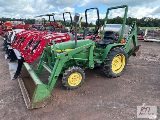 John Deere 770 4WD diesel compact tractor with loader and backhoe, includes belly mower, 936 hrs.