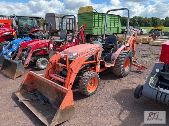 Kubota B3200 4WD diesel compact tractor with loader and backhoe, 3pt arms in the bucket, 923 hrs.