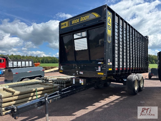H&S wide body forage wagon on H&S 3122 tandem chassis, rear unload, new, unsold inventory.