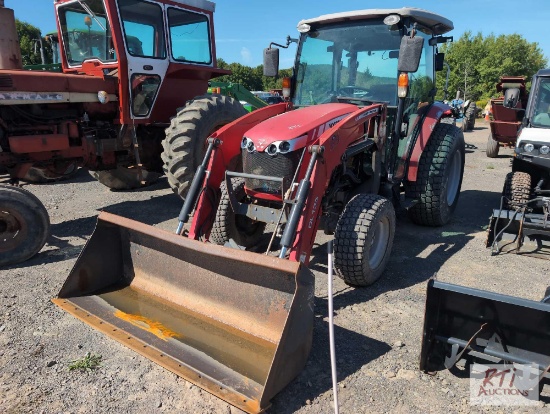 Massey Ferguson 1758 4WD tractor with turf tires, enclosed cab, front loader with bucket, 1059 hrs.