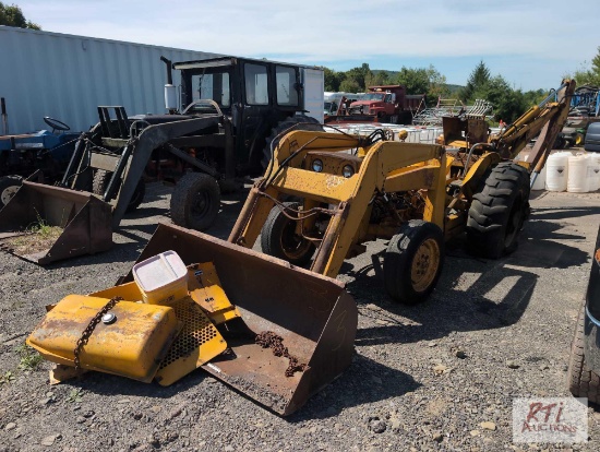 Massey Ferguson tractor-loader-backhoe, needs repair.