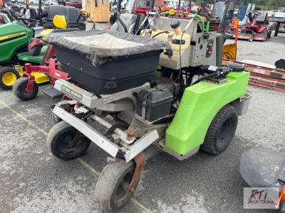 Steel Green ride-on fertilizer spreader machine with small gas engine, 1001hrs.