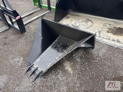 Tree spade for skid loader.