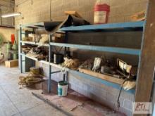 Contents of racking including engine parts, bucket teeth, hardware and more