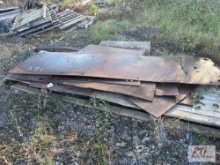 Pile of mixed size flat steel sheets