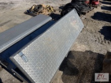 Diamond plate pickup tool box with rubber pipe gaskets