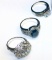 3 Silver Plated Fashion Rings with a pair of crystal berets.