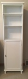 White Storage Cabinet with upper shelfs and lower closed storage.