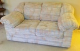 Light Multi-Colored Love Seat Sofa. Dixieland Manufacturing Company. Very good condition.