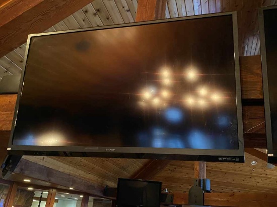 Sharp 60" TV.  Works all the way