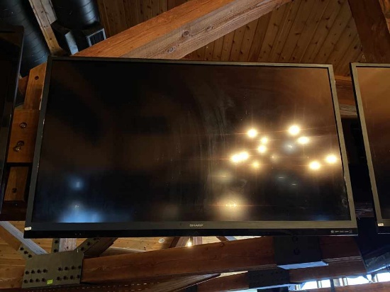 Sharp 60" TV.  Works all the way