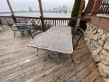 Two Metal Outdoor Tables & 4 Chairs