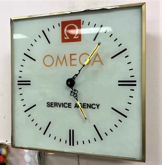 Omega Service Agency Clock