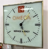 Omega Service Agency Clock