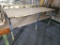 Table w/Shelves Underneath Measures 8'x3'x3'