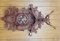 Hunter's decorated Cuckoo Clock With various game animals 32 by 16